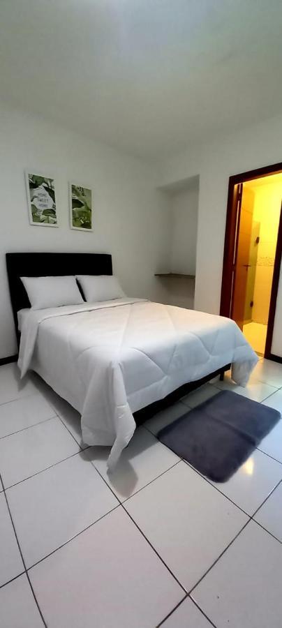 Bliss Hoteis Centro Búzios Esterno foto A bedroom with a bed and a bathroom