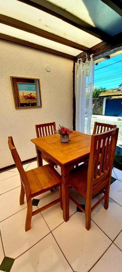 Bliss Hoteis Centro Búzios Esterno foto A dining room table with four chairs